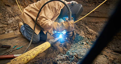 Consumers energy worker welding